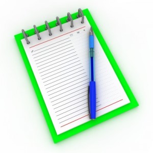 Green notebook with pen | StopHidingBehindTheFat.com